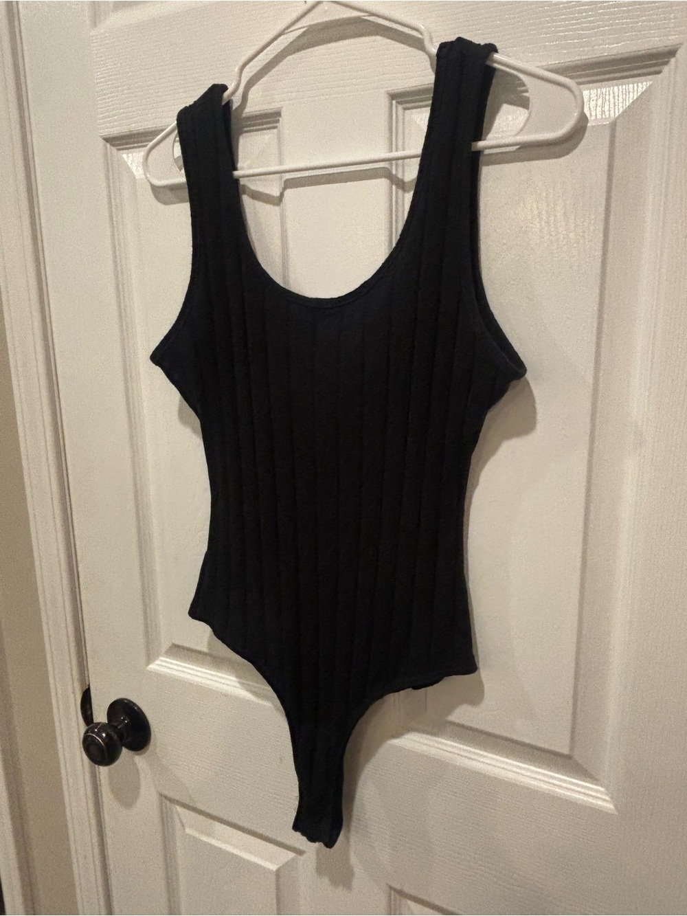 Black Buckle brand Ribbed One-Piece Bodysuit